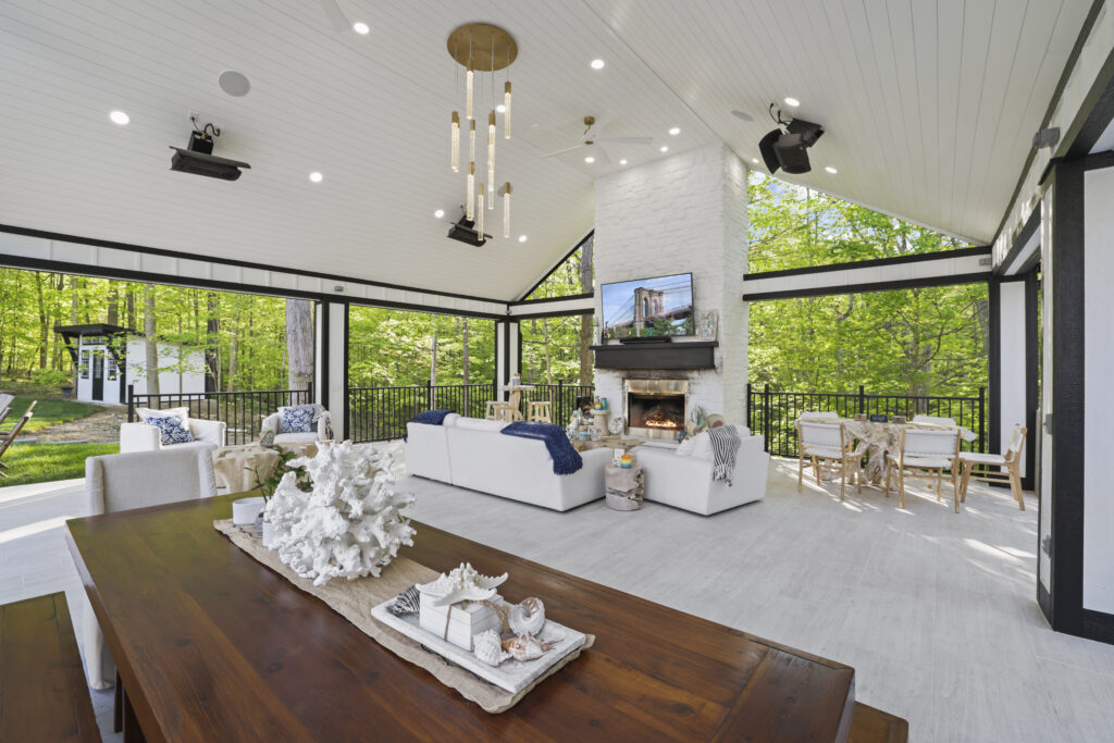 Flores Outdoor Living Space #1 - Flores Landscapes Elegant outdoor living space with chandelier and custom flooring in Central Ohio