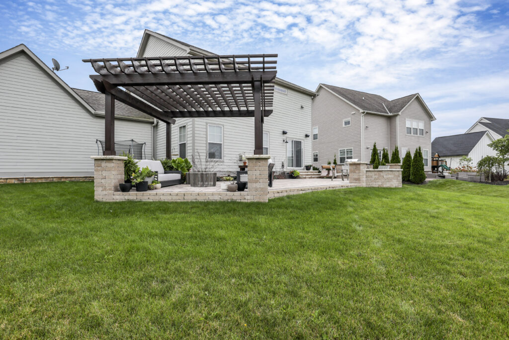 Flores Custom Pergolas #1 - Flores Landscapes Central Ohio backyard with custom-built pergola over outdoor seating