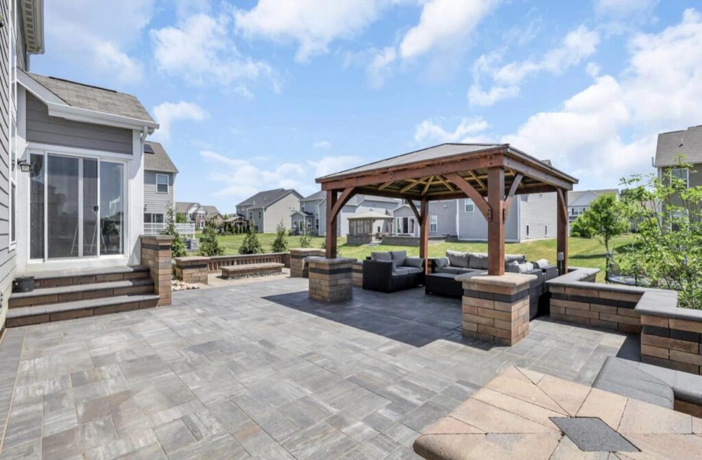 Flores Custom Pergolas #15 - Flores Landscapes Rustic wooden pergola over outdoor seating area on a paver patio in Central Ohio
