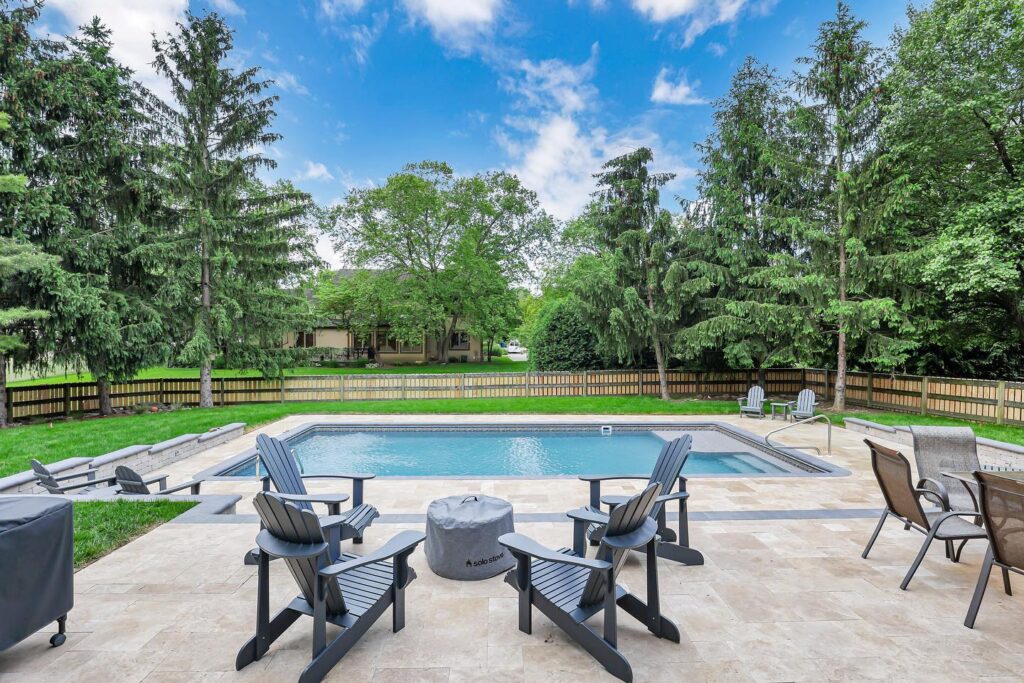 Flores Custom Built Pools #6 - Flores Landscapes Private Central Ohio backyard with custom landscaping and outdoor seating in Central Ohio