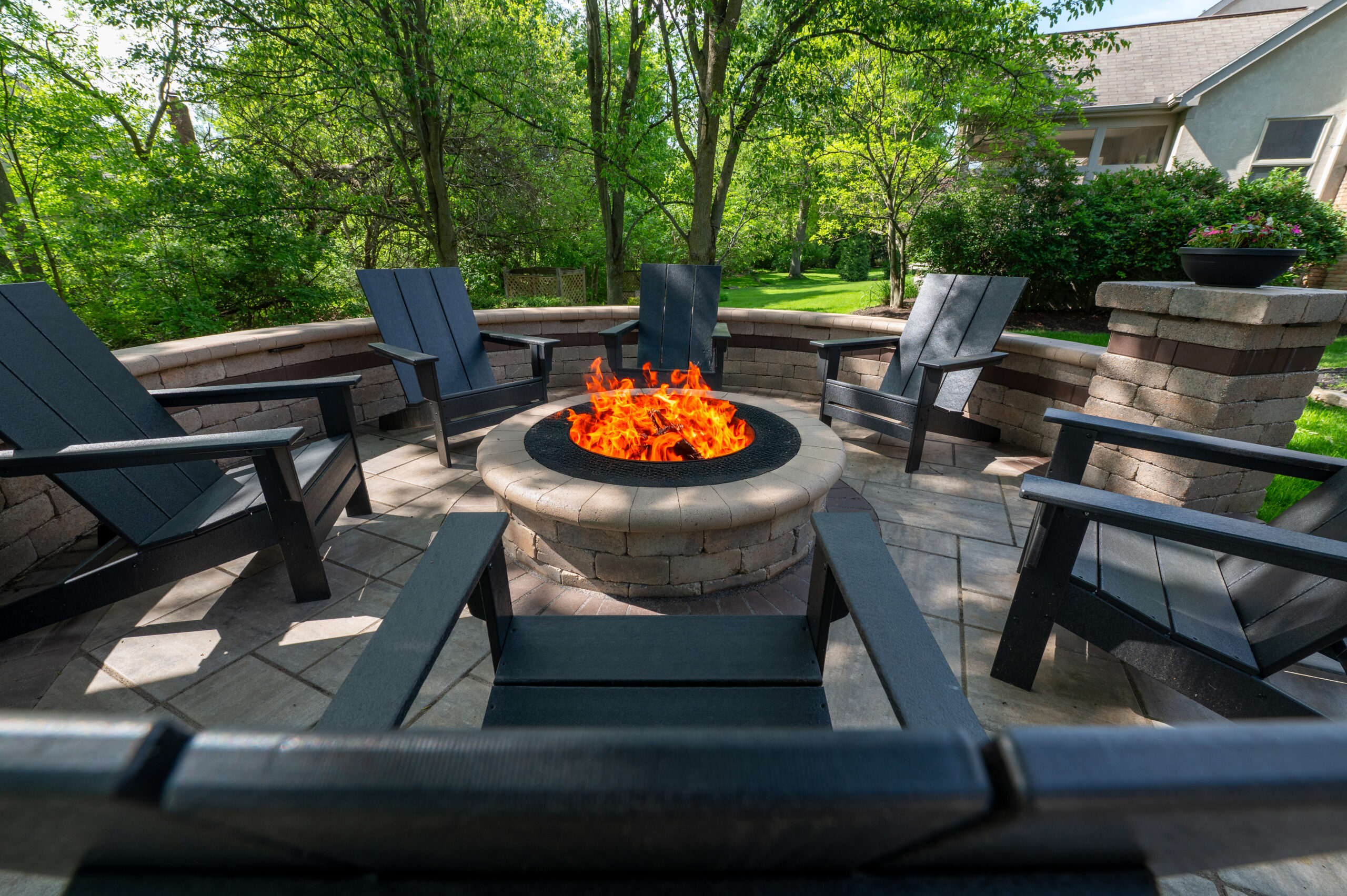 Stone fire pit with custom seating in Central Ohio